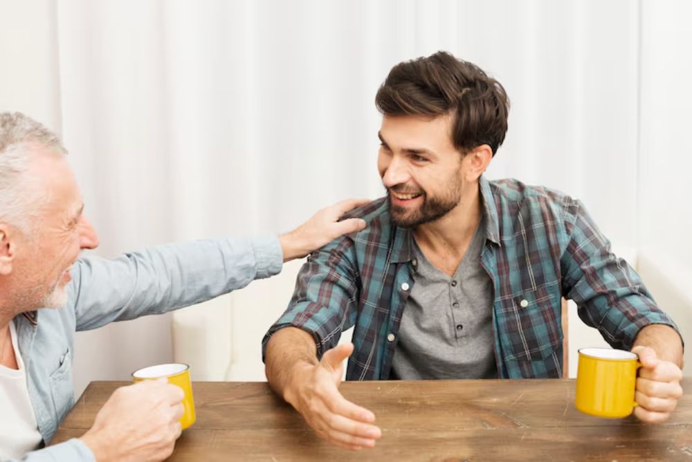 man confidently speaking after adjusting to new dentures